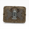 Gold tone Virgen de Guadalupe belt buckle with silver tone image, scrollwork, crystal accents, and beaded border.