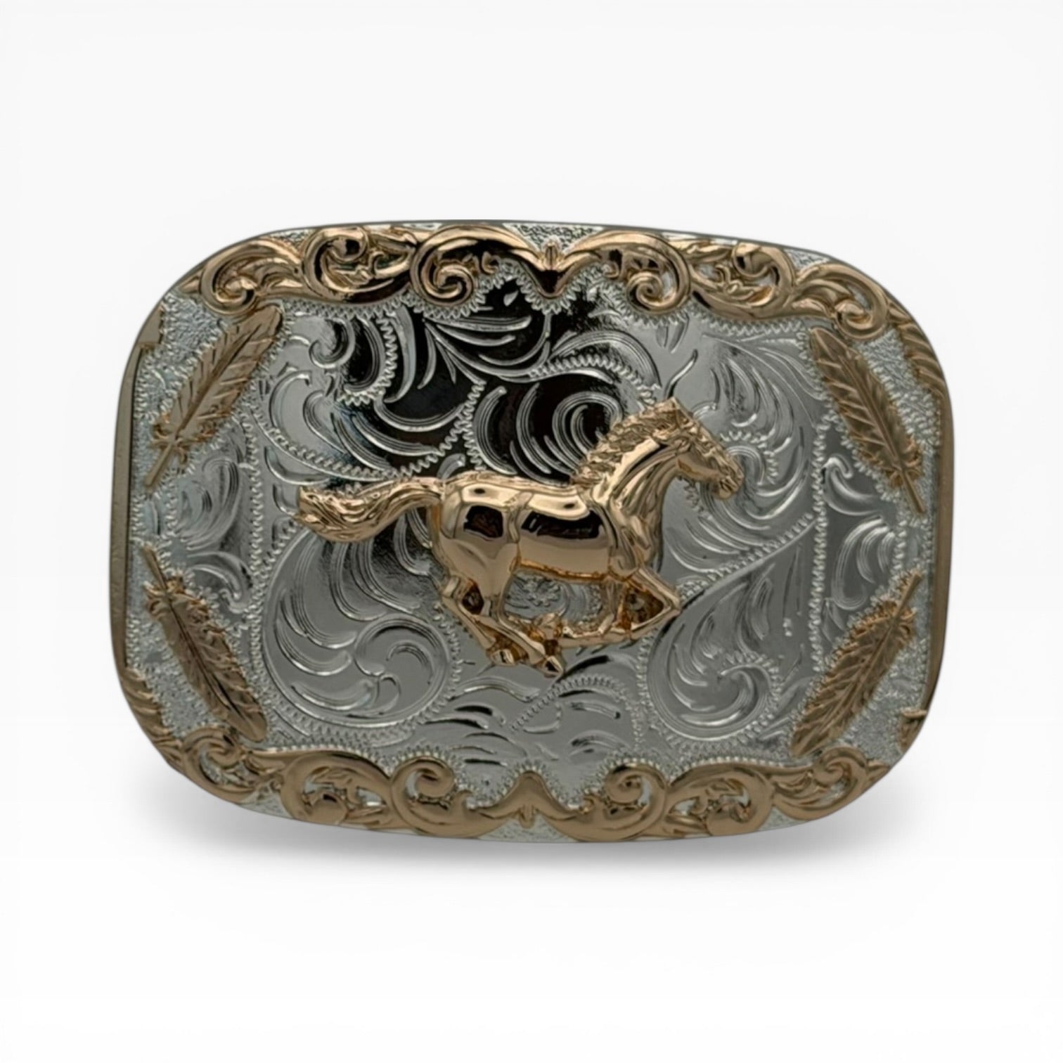 Silver and gold tone running horse belt buckle with western scrollwork and feather accents.