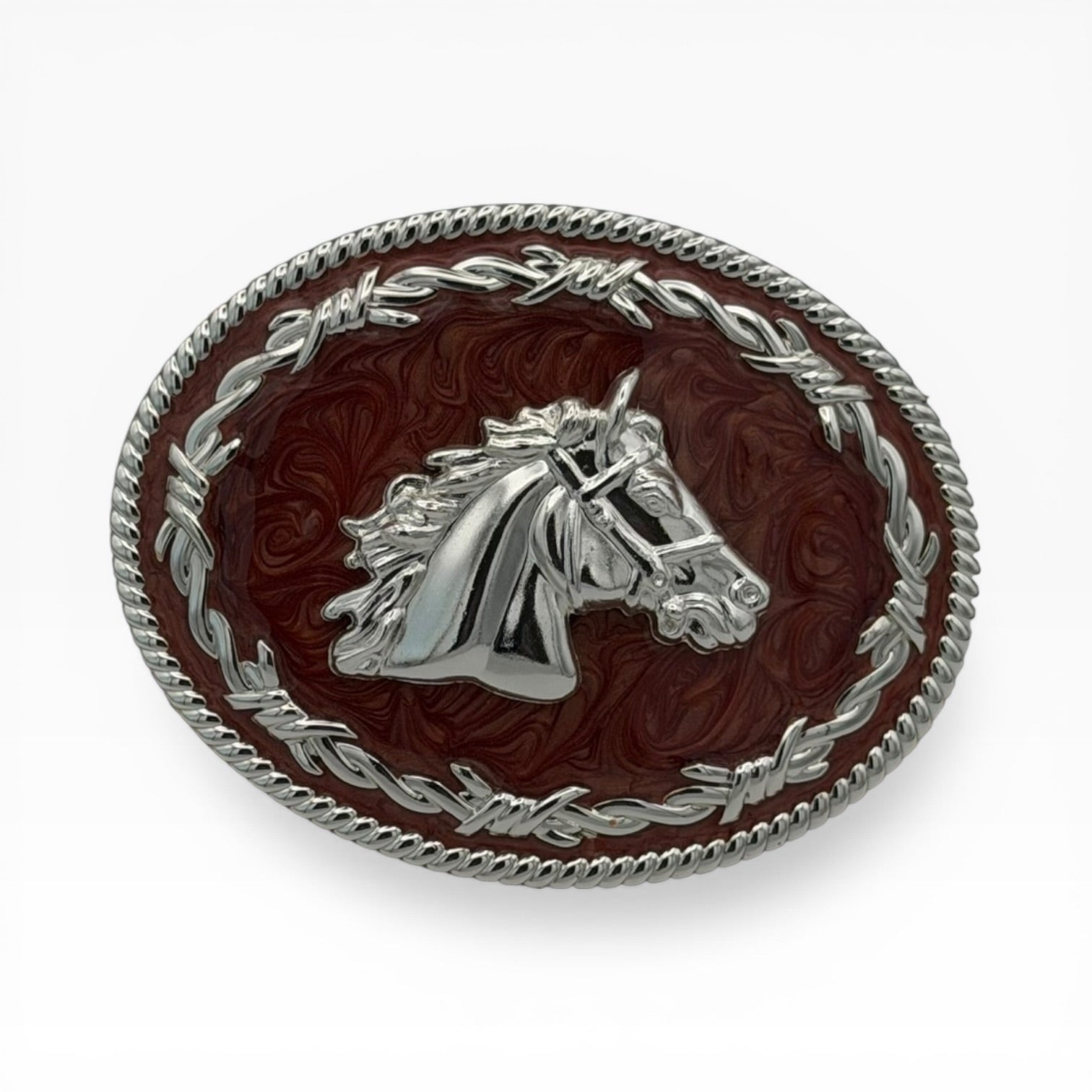 Silver horse head on mahogany oval buckle with barbed wire and rope borders.