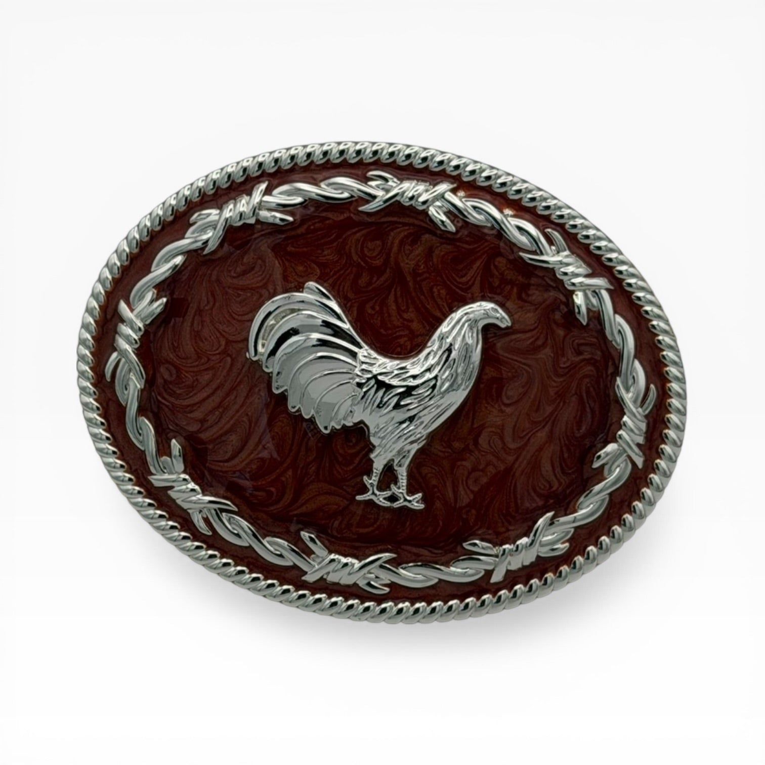 Mahogany oval belt buckle with a silver rooster, barbed wire, and rope edge.