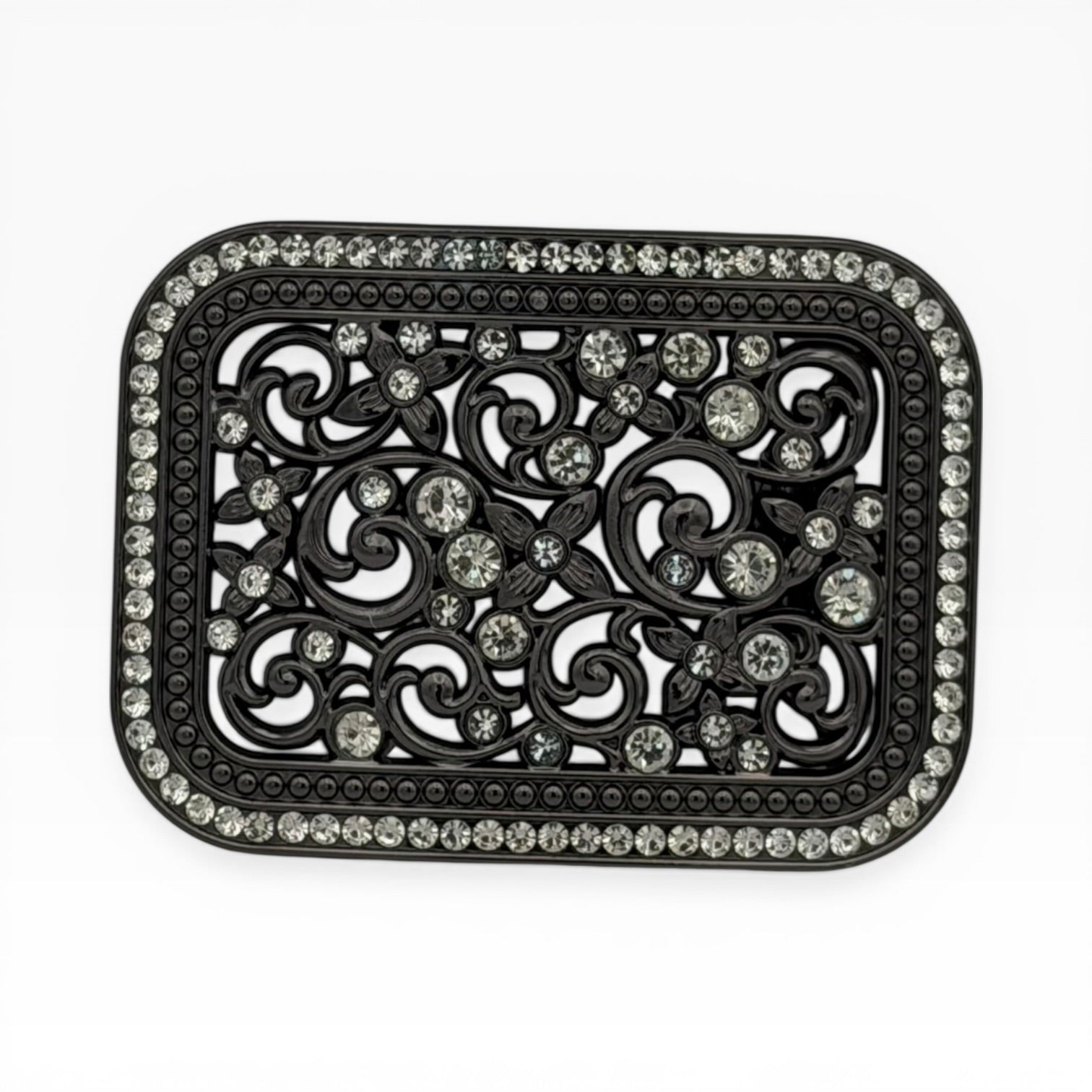 Matte black rhinestone filigree scrollwork buckle with clear crystals and floral cutouts.