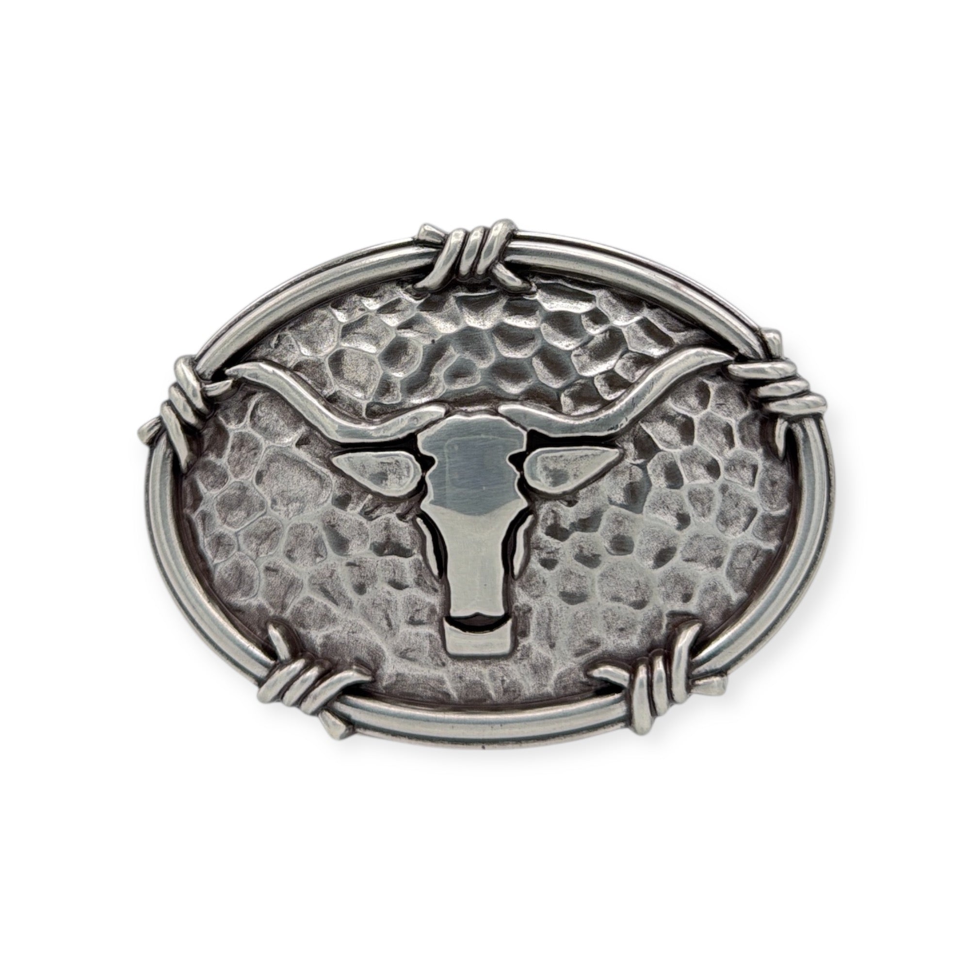 Ariat antique silver oval buckle with steer head motif, hammered background, and barbwire edging.