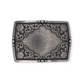 Antique silver Ariat rectangle buckle with raised floral engraving and textured center.