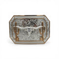 Silver western buckle with a detailed longhorn, gold cactus accents, and intricate scroll engraving.