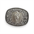 Polished silver-tone San Judas Devotion Buckle with intricate western floral engraving and rhinestone accents.