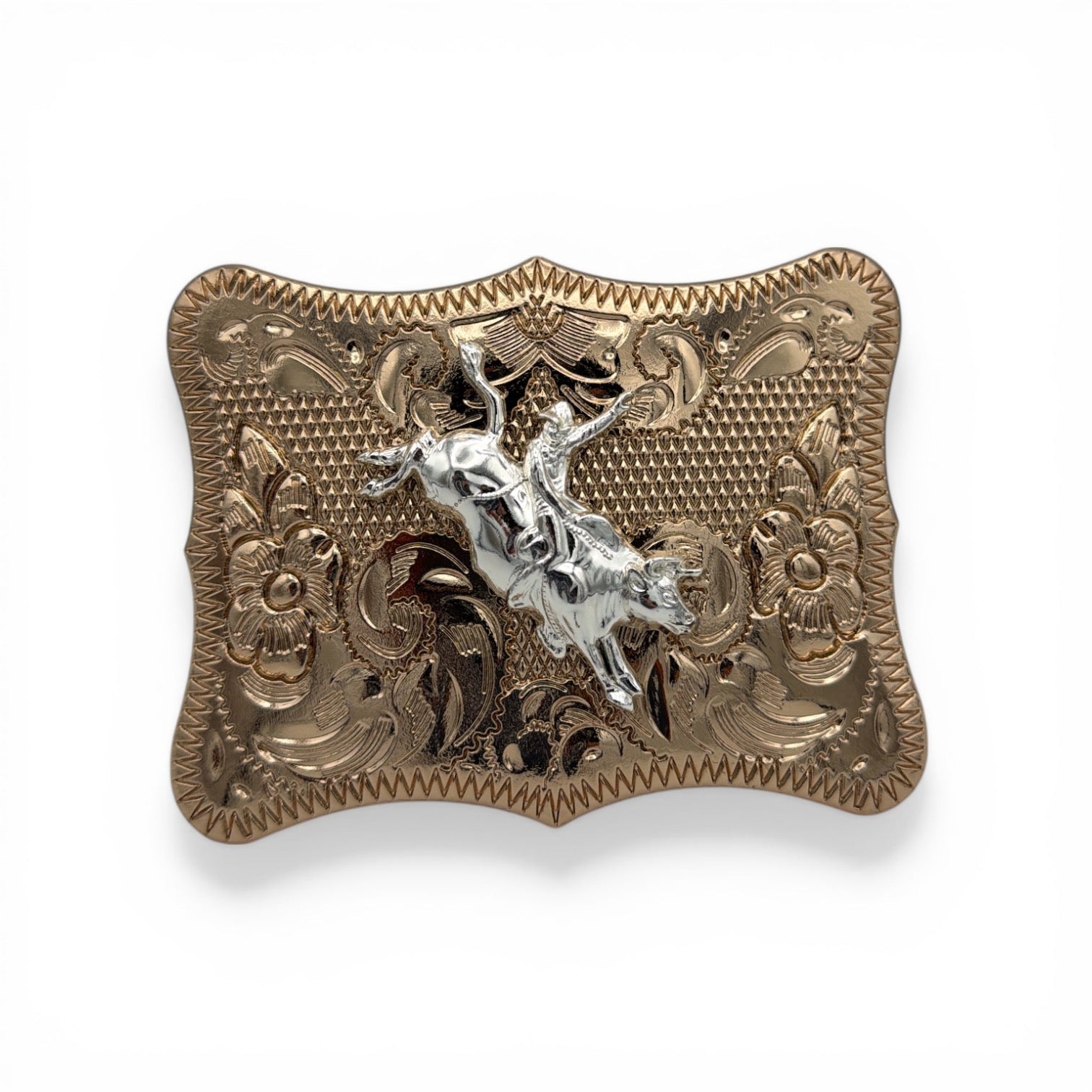 Gold tone Copper Rodeo Heritage Buckle with silver bull rider, floral engravings, and curved shape.