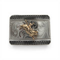 Silver Outlaw Rodeo Buckle with gold bull rider, engraved silver scrolls, and black geometric border.