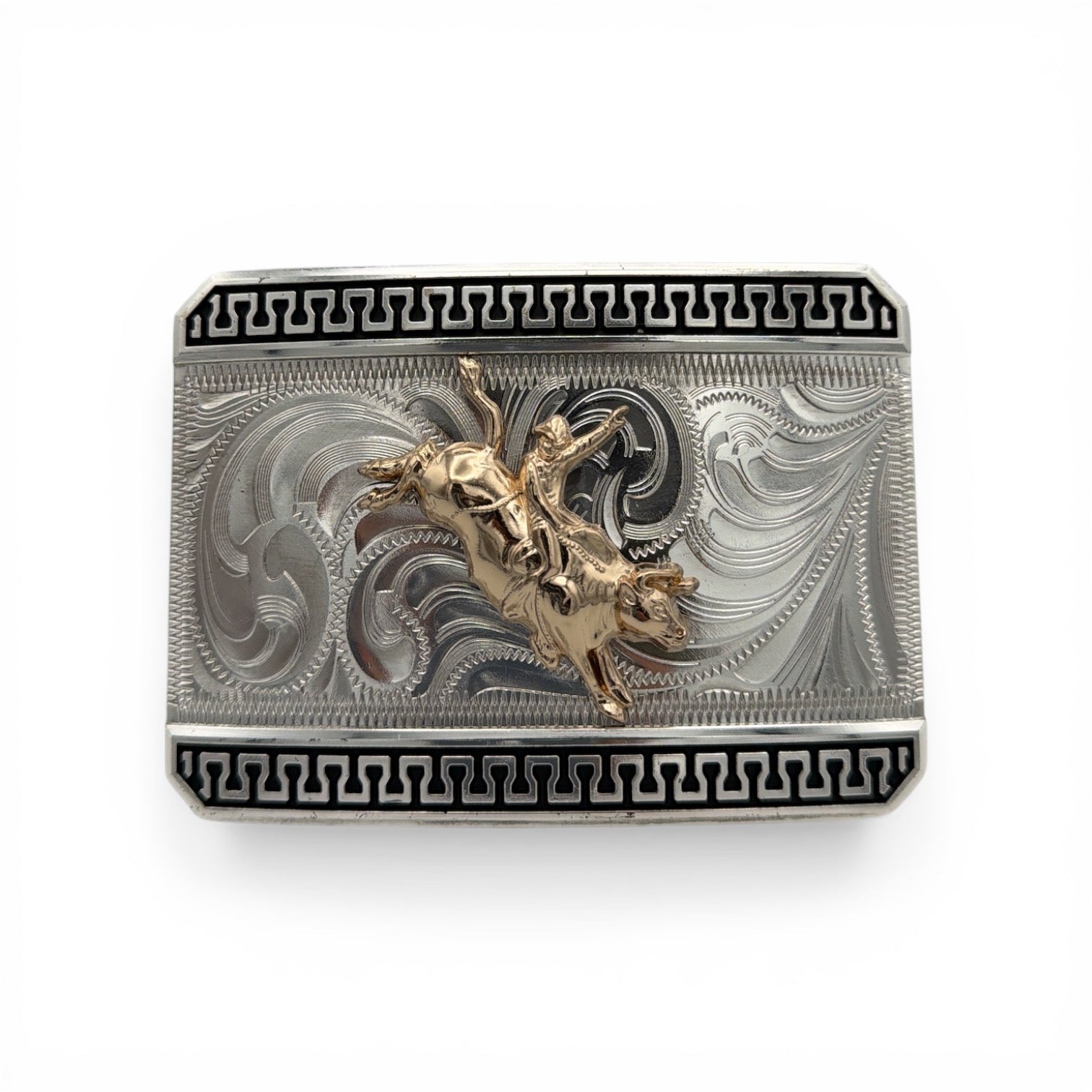 Silver Outlaw Rodeo Buckle with gold bull rider, engraved silver scrolls, and black geometric border.