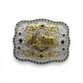 Two-tone silver and gold Blessed Cowboy Prayer Buckle with kneeling cowboy, horse, cross, scrollwork, and black stones.