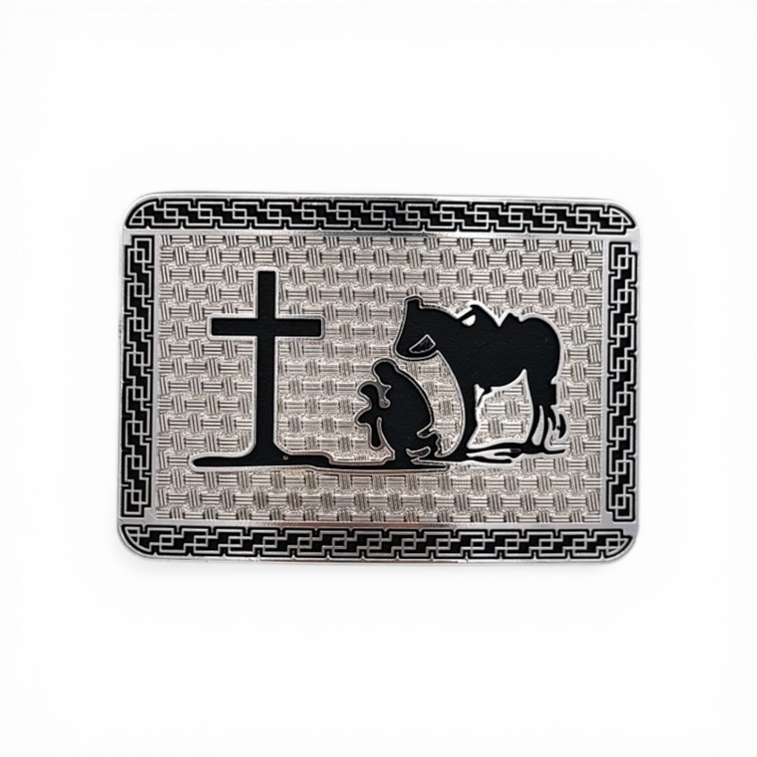 Silver tone buckle with black silhouette of a kneeling cowboy, horse, and cross, framed by a geometric border.