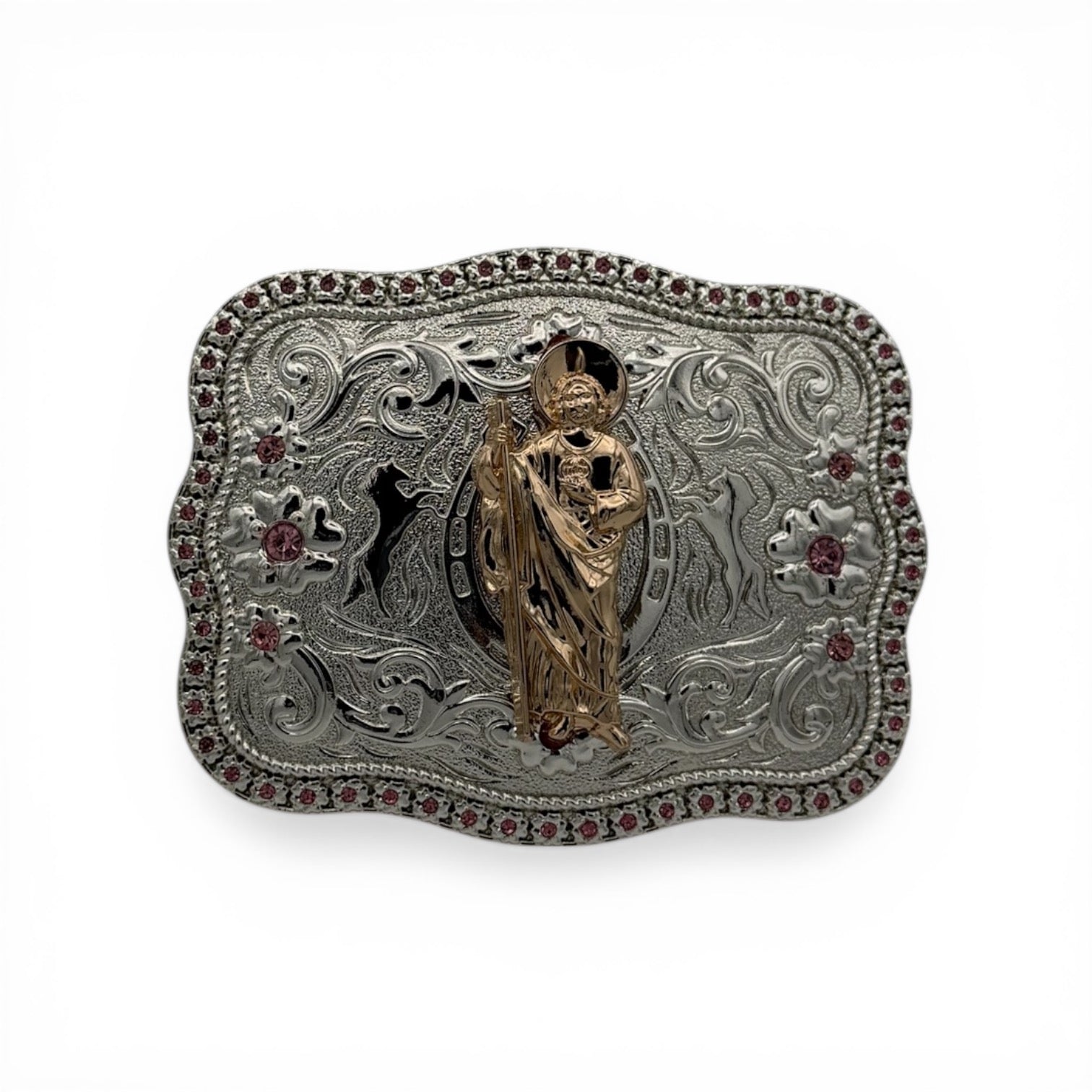 Two-tone gold and silver western buckle with a Saint Jude figure, scroll engraving, horse silhouettes, and pink stone border.