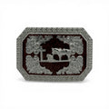 Silver tone Cowboy Faith Woodgrain Buckle with kneeling cowboy, horse, cross, and western scroll engravings.