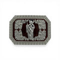 Silver Saint Jude woodgrain faith buckle with western scroll engravings and rope border.