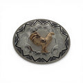 Golden Rooster Aztec Oval Buckle: two-tone gold rooster on silver scrollwork with black Aztec border.