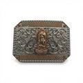 Two-tone gold and silver Western buckle with a detailed Virgen de Guadalupe centerpiece and scroll engraving.