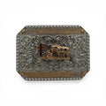 Two-tone gold and silver western buckle with a kneeling cowboy, horse, cross, scrollwork, and beaded edge.