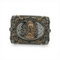 Silver and gold tone Our Lady of Grace buckle with intricate scrollwork, rope border, and stone accents.