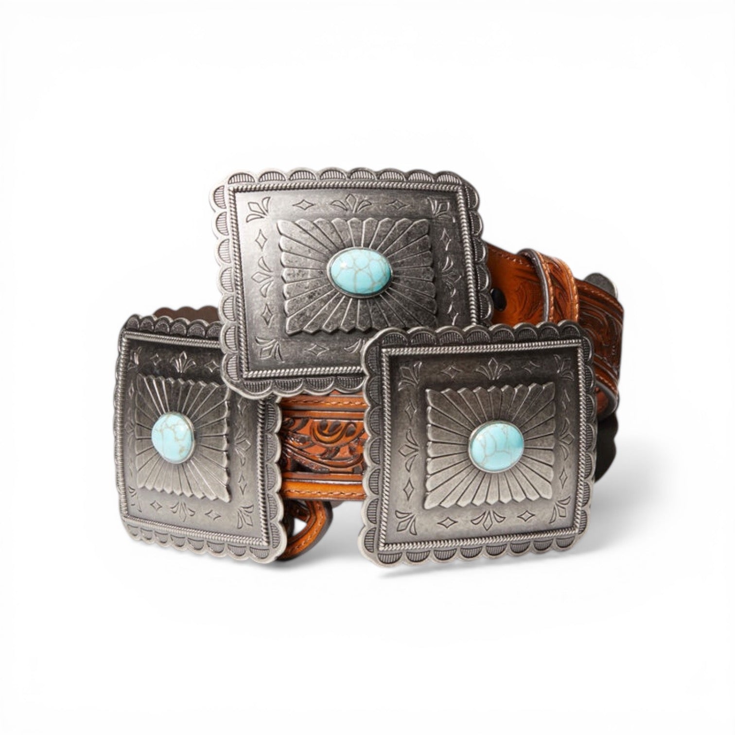 Ariat 1 1/2" tan leather belt with large pierced rectangle conchos and turquoise stones.