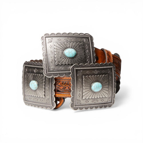 Ariat 1 1/2" tan leather belt with large pierced rectangle conchos and turquoise stones.