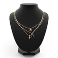 TRIO LAYER HORSESHOE HAT CROSS CAHRM NECKLACE | 80N436: Gold